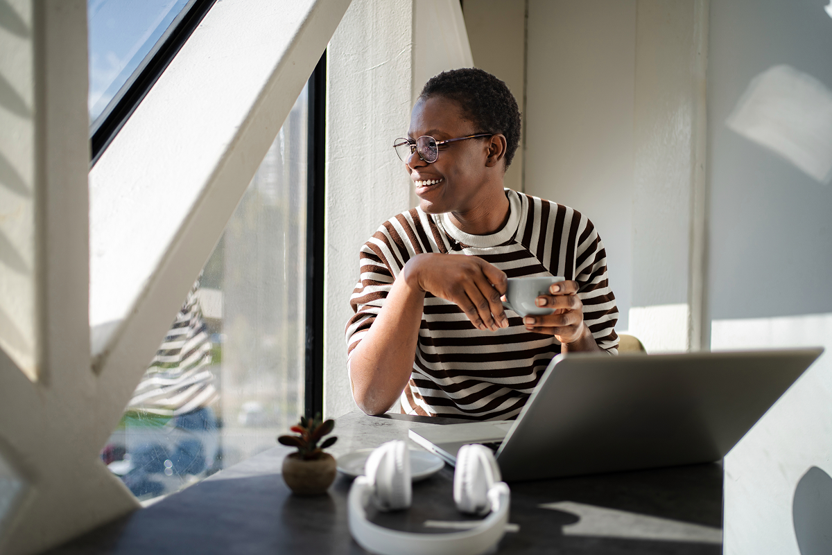 A team member working at a laptop