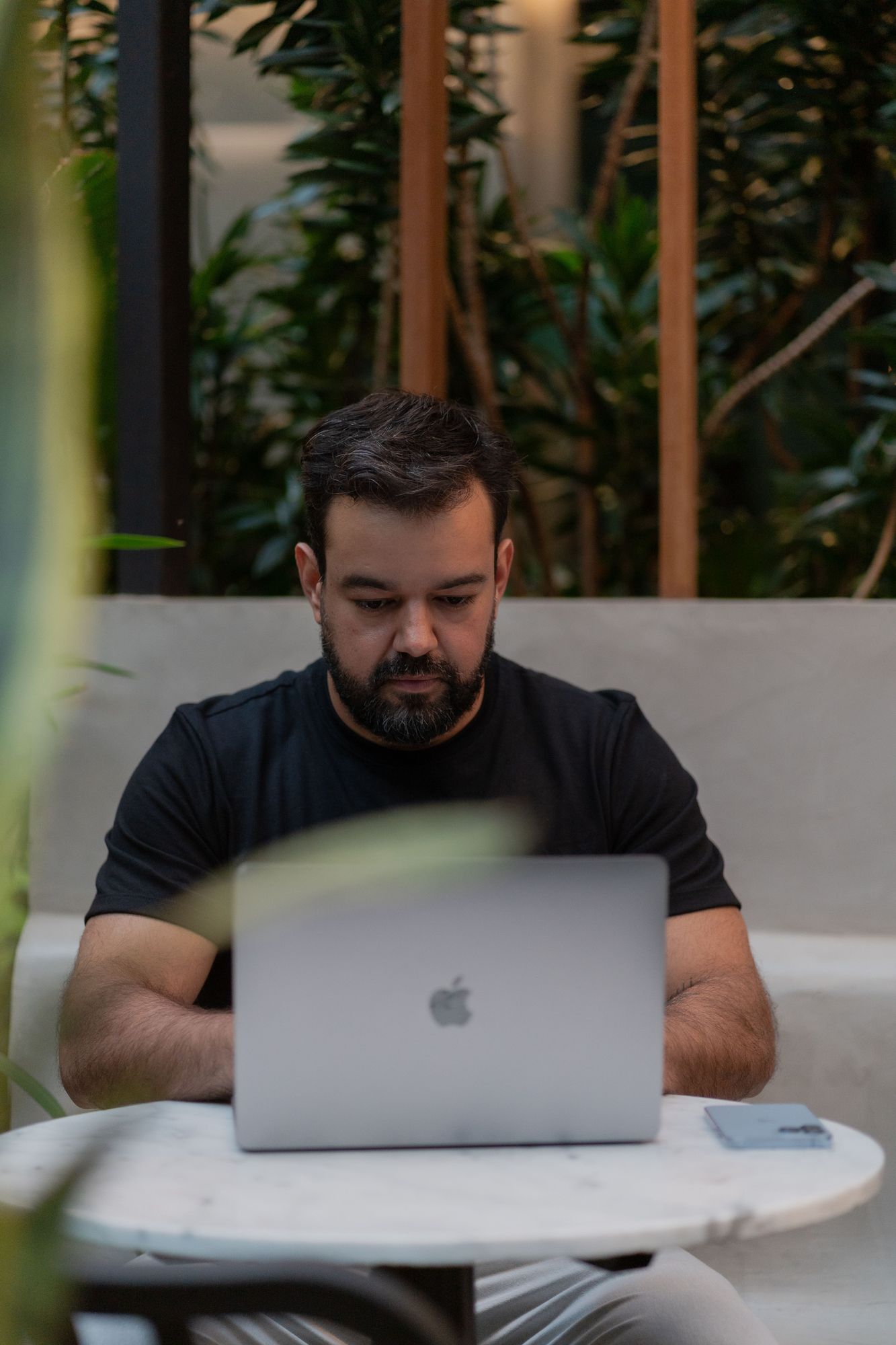An agent reviewing applications on his laptop